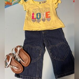 12 M girl outfit!  Spread love t-shirt, blue jeans with heart knees.